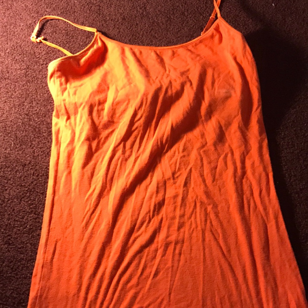 A orange tank top